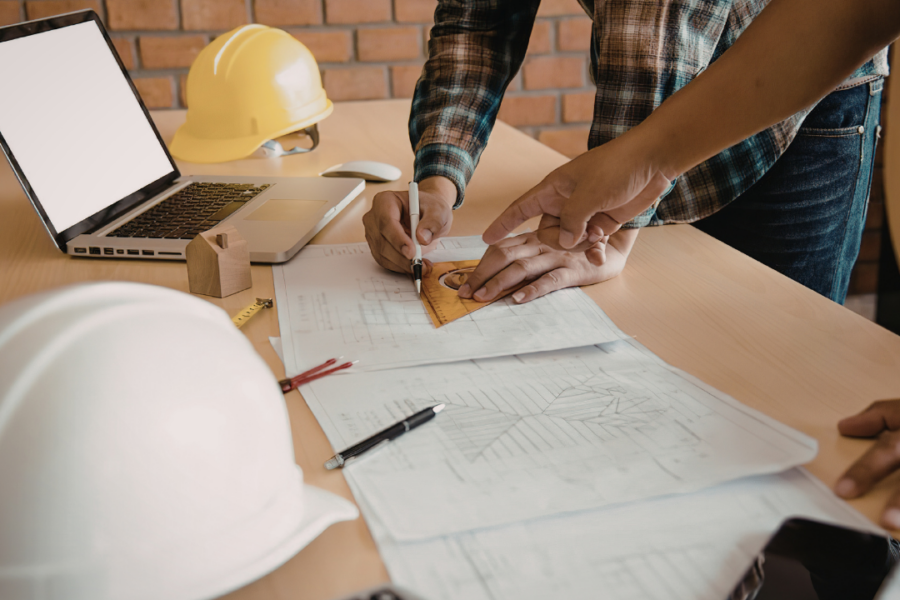 Fire protection engineer conducting commercial fire alarm permit review approval