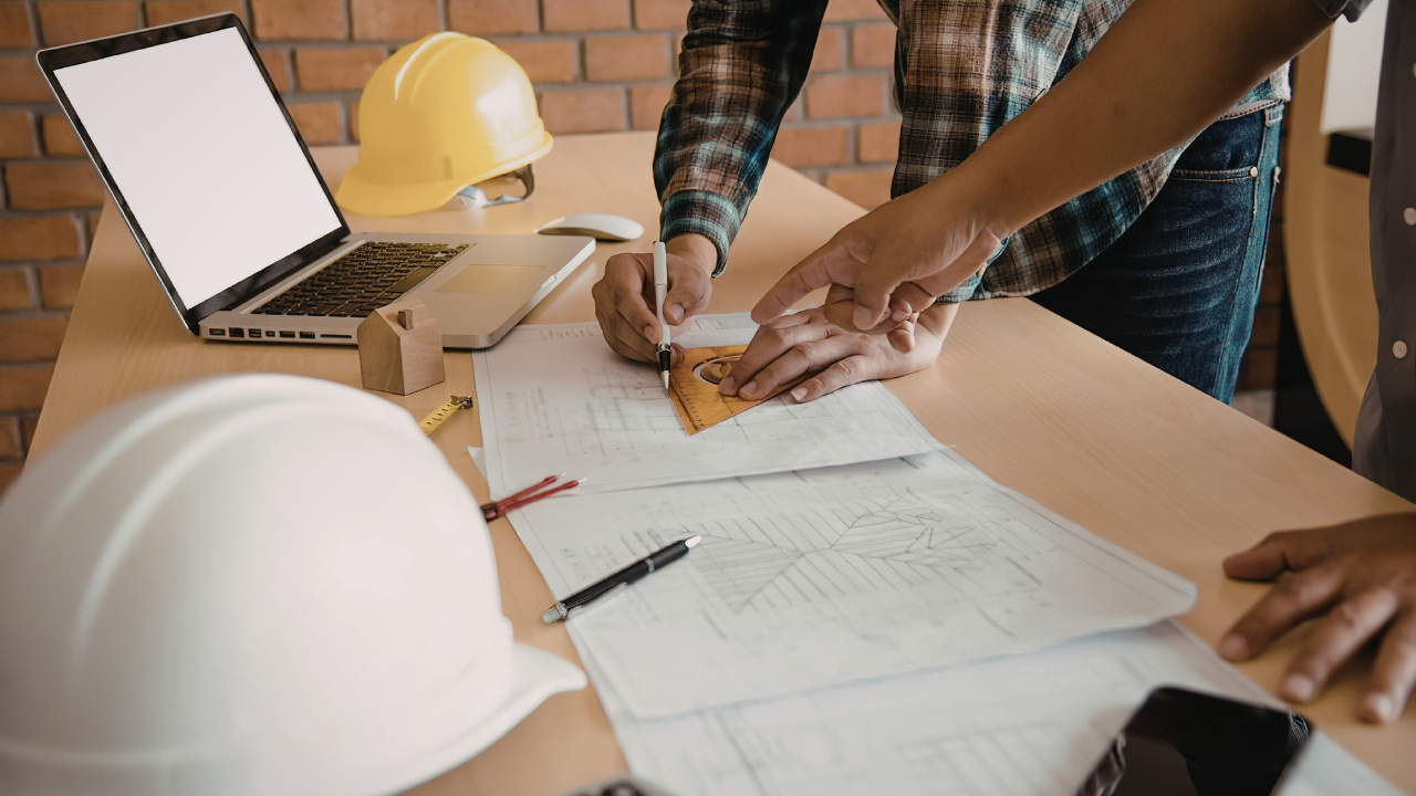 Fire protection engineer conducting commercial fire alarm permit review approval