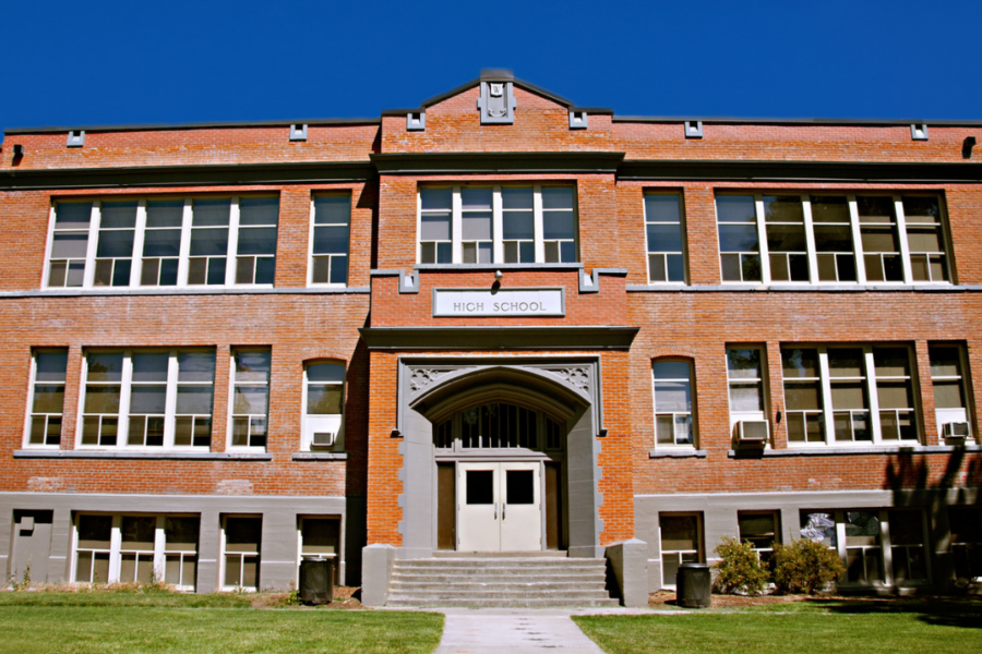 Modern school security systems with surveillance cameras and controlled building access