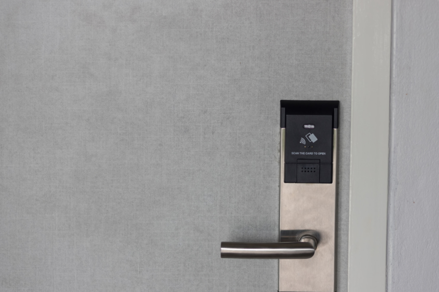 Commercial wireless access control lock installed on secured building entrance