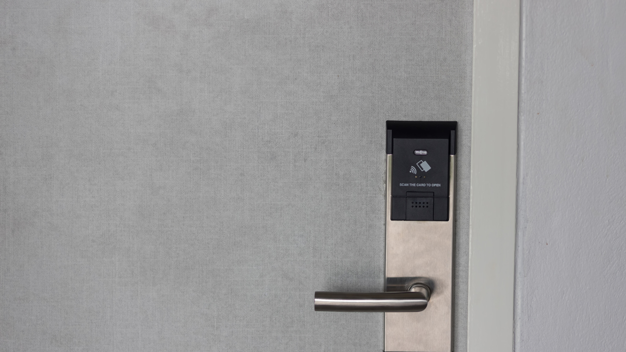 Commercial wireless access control lock installed on secured building entrance